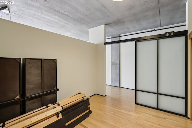 bedroom with light wood-style floors