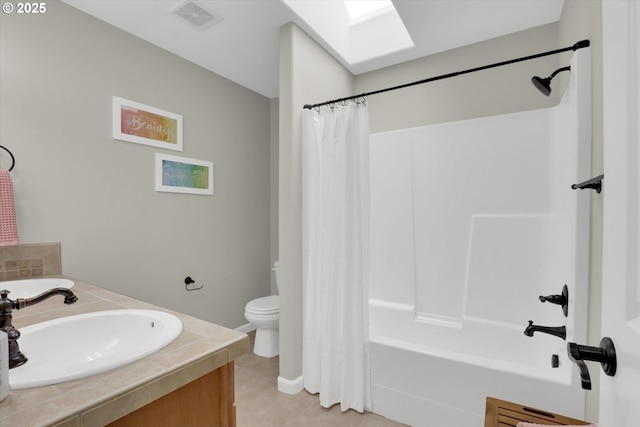 1910 S 15th Cir, Ridgefield, WA 98642 - bathroom featuring toilet, shower / bath combo with shower curtain, tile patterned floors, and vanity