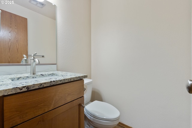 251 NE Village Squire Ave Unit 15, Gresham, OR 97030 - half bathroom with vanity and toilet