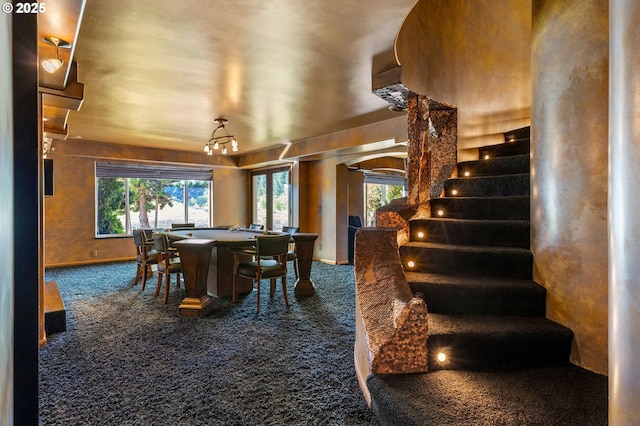 6421 Brooklake Rd, Salem, OR 97305 - dining space with carpet, baseboards, and stairs