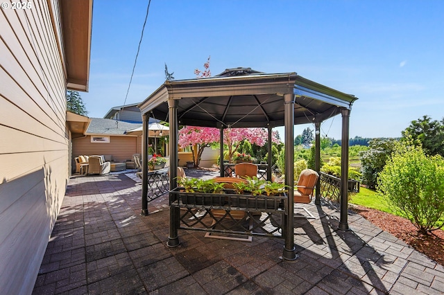 6421 Brooklake Rd, Salem, OR 97305 - view of patio / terrace featuring a gazebo and an outdoor living space