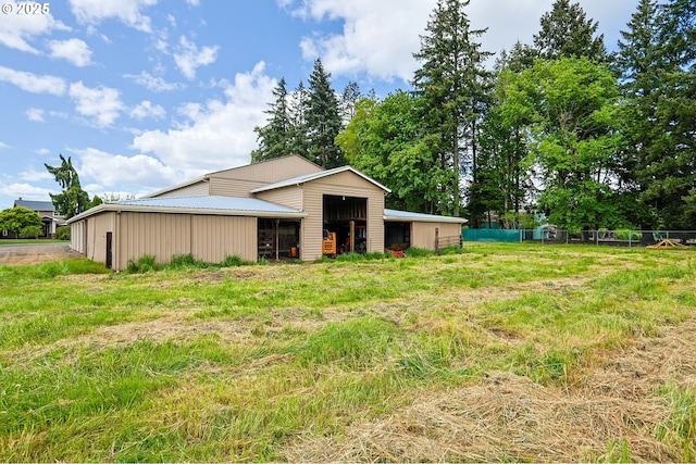 6421 Brooklake Rd, Salem, OR 97305 - rear view of property featuring a pole building, an outdoor structure, and fence