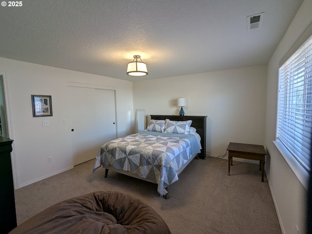 250 W 13th St, Lafayette, OR 97127 - bedroom with carpet, baseboards, and a textured ceiling