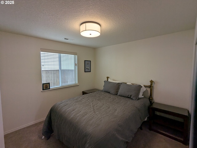 250 W 13th St, Lafayette, OR 97127 - carpeted bedroom with a textured ceiling and baseboards