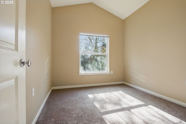 22864 SW Forest Creek Dr Unit 200, Sherwood, OR 97140 - carpeted spare room featuring vaulted ceiling and baseboards