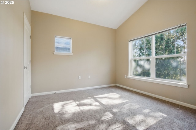 22864 SW Forest Creek Dr Unit 200, Sherwood, OR 97140 - empty room featuring vaulted ceiling, baseboards, and carpet