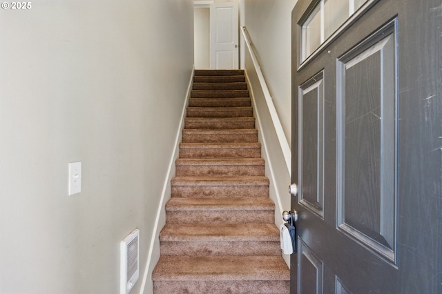 22864 SW Forest Creek Dr Unit 200, Sherwood, OR 97140 - staircase featuring baseboards and heating unit