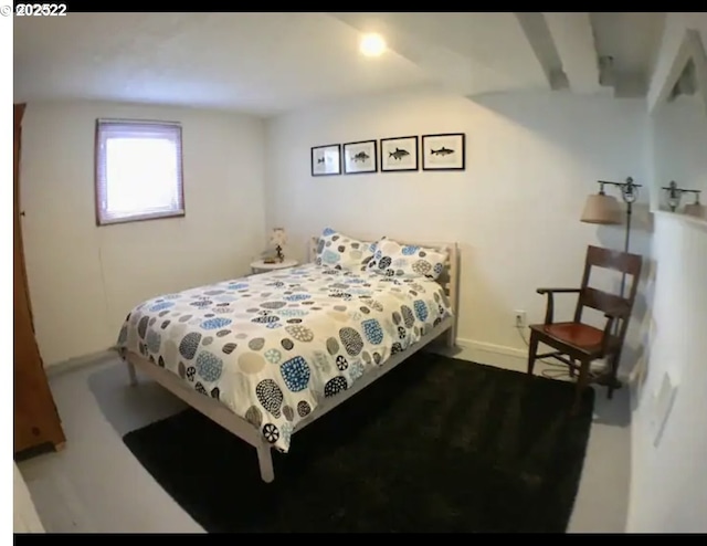 bedroom featuring baseboards