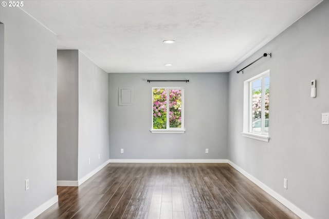 63 S 22nd St, Saint Helens, OR 97051 - spare room with wood finished floors, baseboards, and recessed lighting