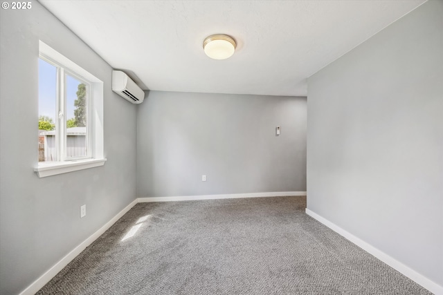63 S 22nd St, Saint Helens, OR 97051 - carpeted empty room with a wall unit AC and baseboards