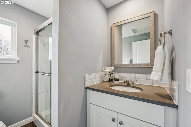63 S 22nd St, Saint Helens, OR 97051 - bathroom with a stall shower, vanity, and decorative backsplash