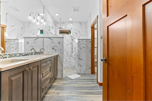 39100 SE Tumala Mountain Rd, Estacada, OR 97023 - full bathroom with a marble finish shower, double vanity, and wood finished floors