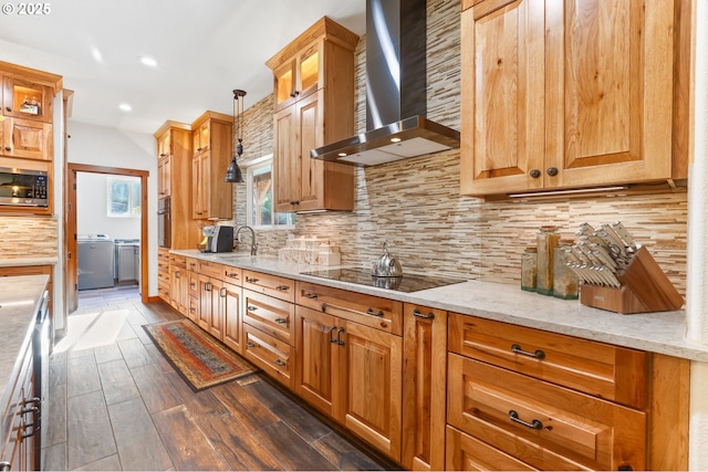 39100 SE Tumala Mountain Rd, Estacada, OR 97023 - kitchen featuring wall chimney range hood, black appliances, a sink, dark wood-style flooring, and decorative backsplash