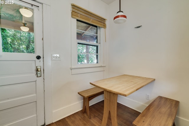 1236 N Emerson St, Portland, OR 97217 - dining area with baseboards and dark wood-style flooring