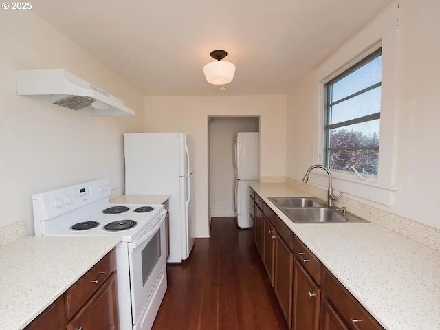 1236 N Emerson St, Portland, OR 97217 - kitchen featuring white appliances, a sink, under cabinet range hood, light countertops, and dark wood-type flooring