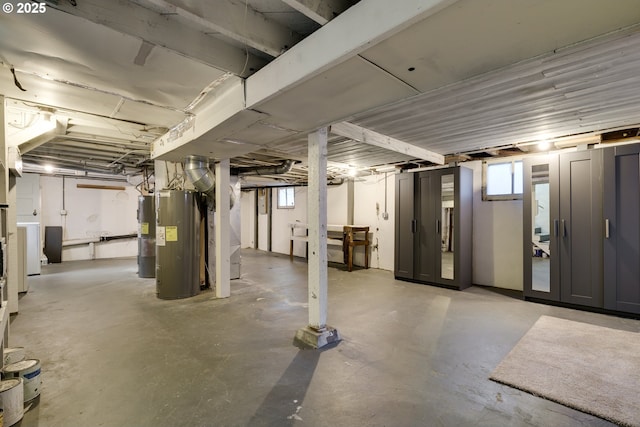 1236 N Emerson St, Portland, OR 97217 - basement featuring water heater and healthy amount of natural light
