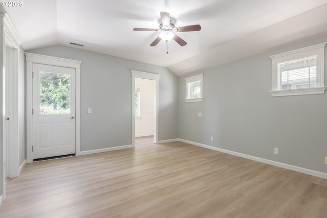1507 Bogart Ln, Eugene, OR 97401 - spare room featuring lofted ceiling, ceiling fan, and light wood-style flooring