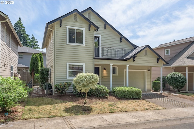 1507 Bogart Ln, Eugene, OR 97401 - view of front facade featuring an attached garage, driveway, and a balcony