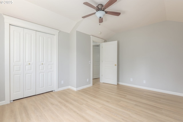 1507 Bogart Ln, Eugene, OR 97401 - unfurnished bedroom featuring light wood-style flooring, vaulted ceiling, a closet, and a ceiling fan
