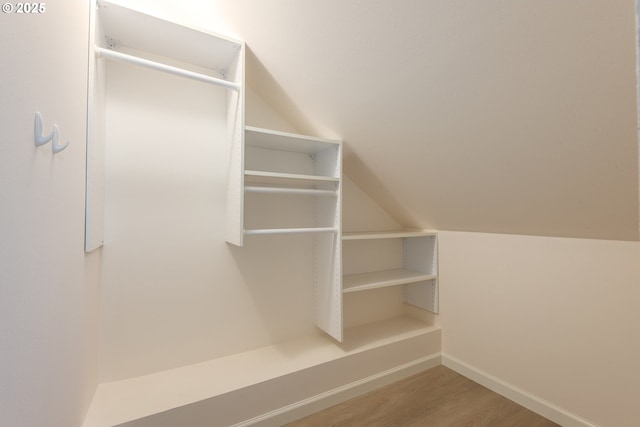1507 Bogart Ln, Eugene, OR 97401 - spacious closet featuring wood finished floors and vaulted ceiling