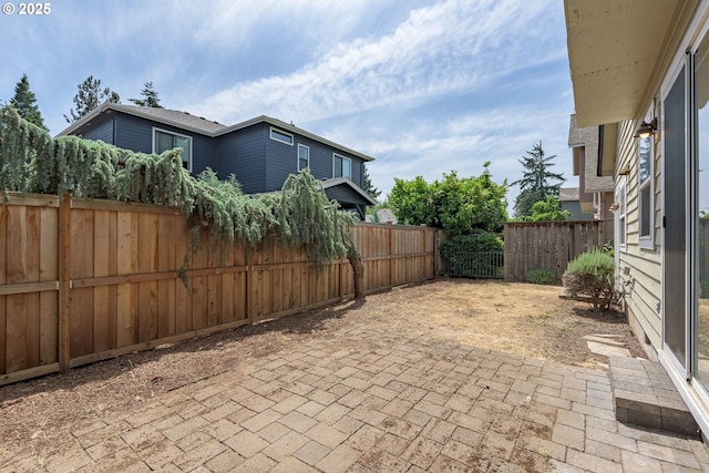 1507 Bogart Ln, Eugene, OR 97401 - fenced backyard with a patio area