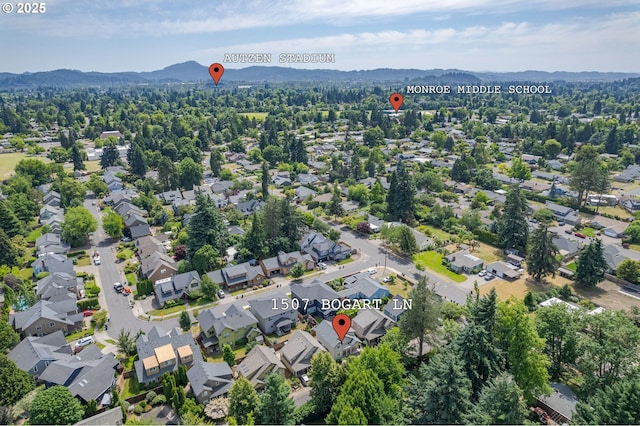 1507 Bogart Ln, Eugene, OR 97401 - aerial view of residential area featuring a mountainous background