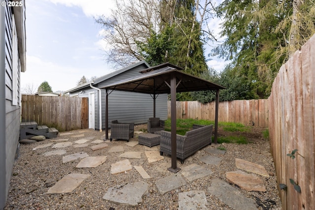 view of patio with a gazebo and a fenced backyard