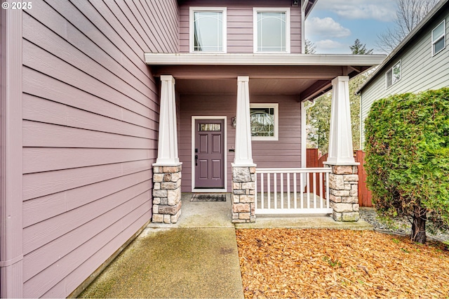 doorway to property with covered porch