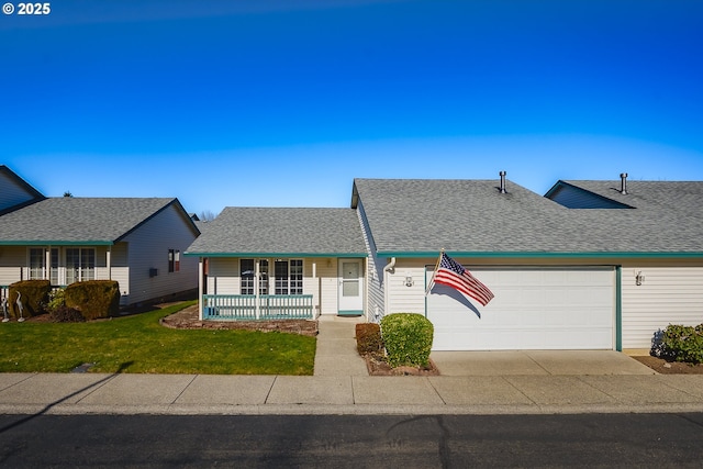 view of front of house featuring covered porch, roof with shingles, an attached garage, and a front lawn