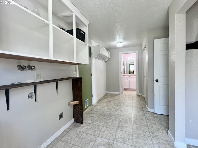 940 W Madrona Ave, Hermiston, OR 97838 - washroom featuring a textured ceiling and hookup for an electric dryer