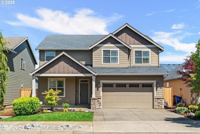 14727 Purple Ash Way, Oregon City, OR 97045 - craftsman house featuring board and batten siding, a shingled roof, a garage, and driveway