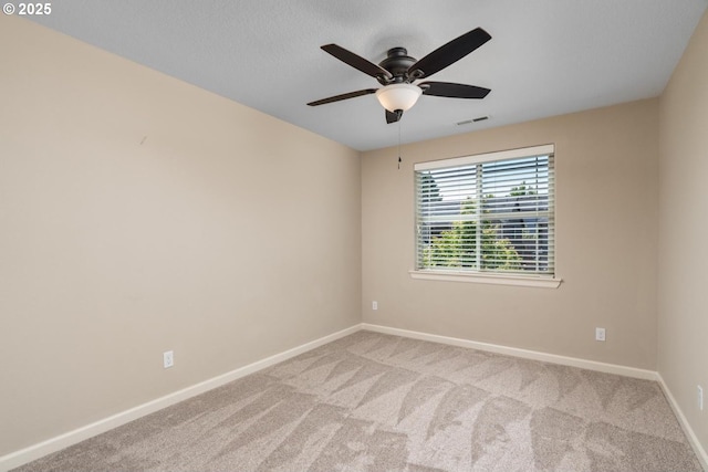 14727 Purple Ash Way, Oregon City, OR 97045 - carpeted spare room with baseboards and a ceiling fan