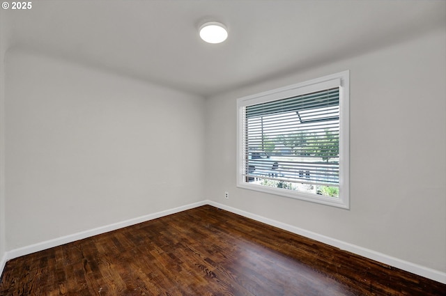1119 7th St, Springfield, OR 97477 - unfurnished room featuring baseboards and dark wood-style flooring
