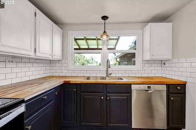 1119 7th St, Springfield, OR 97477 - kitchen with dishwasher, butcher block countertops, a sink, white cabinets, and backsplash