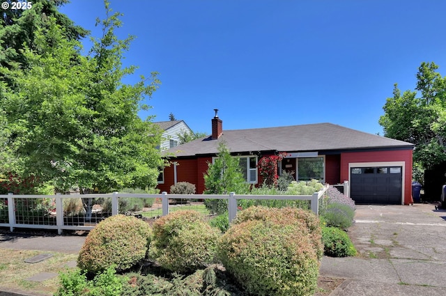 1119 7th St, Springfield, OR 97477 - ranch-style home featuring a garage, a chimney, and driveway