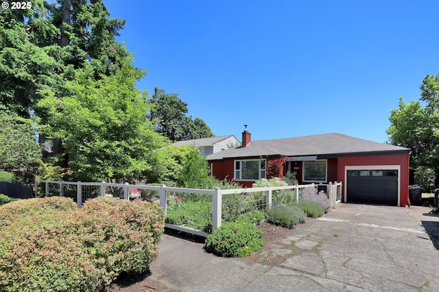 1119 7th St, Springfield, OR 97477 - single story home with a garage, a chimney, and driveway