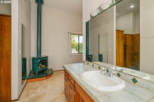 3794 E Nanitch Cir S, Salem, OR 97306 - bathroom with a wood stove and vanity