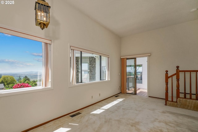 3794 E Nanitch Cir S, Salem, OR 97306 - spare room with carpet, a high ceiling, and baseboards