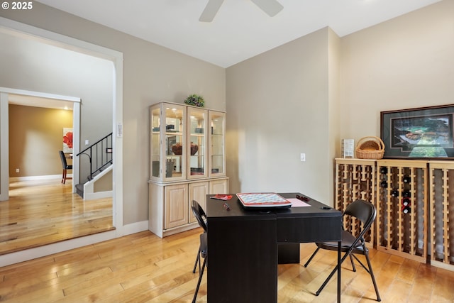 152 Palos Verdes, White Salmon, WA 98672 - dining space with light wood finished floors, ceiling fan, stairs, baseboards, and an office area