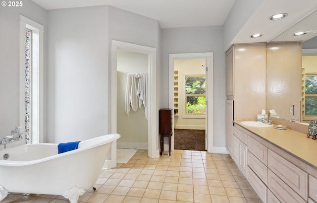 152 Palos Verdes, White Salmon, WA 98672 - bathroom with vanity, a soaking tub, tile patterned flooring, baseboards, and recessed lighting