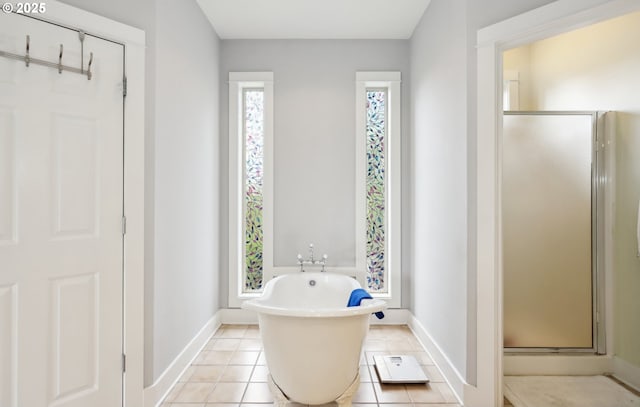 152 Palos Verdes, White Salmon, WA 98672 - full bathroom featuring a stall shower, baseboards, a soaking tub, and tile patterned flooring