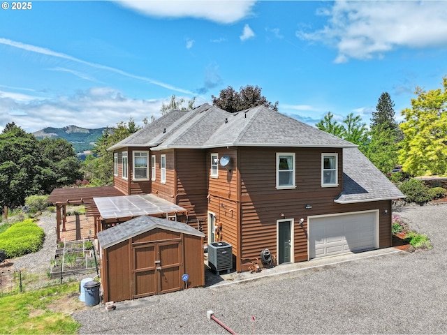 152 Palos Verdes, White Salmon, WA 98672 - chalet / cabin with central air condition unit, roof with shingles, and a mountain view