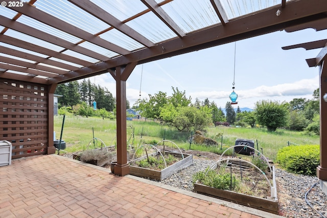 152 Palos Verdes, White Salmon, WA 98672 - view of patio with a vegetable garden and a pergola