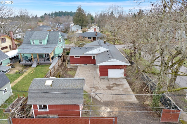 birds eye view of property with a residential view