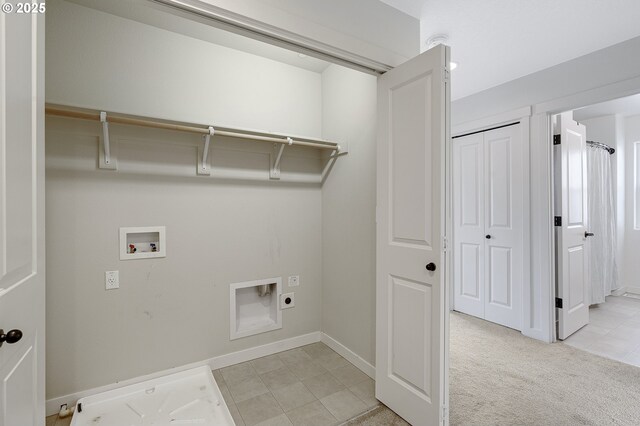 washroom featuring light carpet, laundry area, baseboards, hookup for an electric dryer, and washer hookup