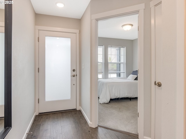 doorway featuring hardwood / wood-style floors