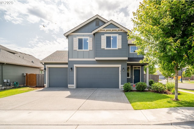 1012 NE 11th Ct, Battle Ground, WA 98604 - craftsman inspired home featuring board and batten siding, concrete driveway, and a garage