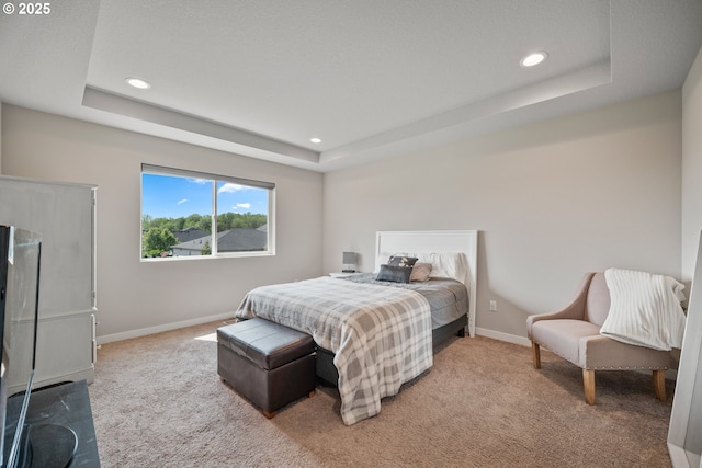 1012 NE 11th Ct, Battle Ground, WA 98604 - bedroom featuring a tray ceiling, carpet floors, and recessed lighting