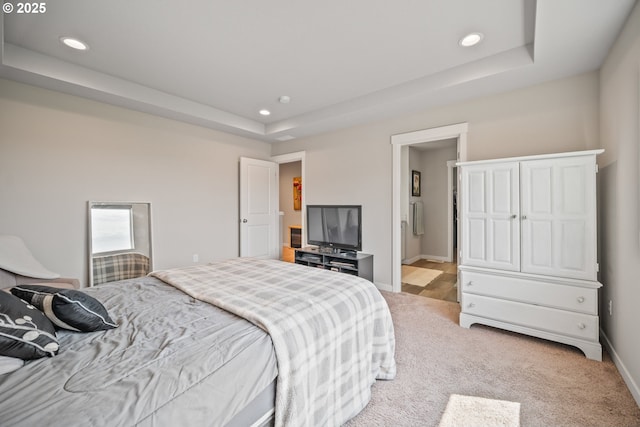 1012 NE 11th Ct, Battle Ground, WA 98604 - bedroom with recessed lighting, carpet flooring, a tray ceiling, and connected bathroom