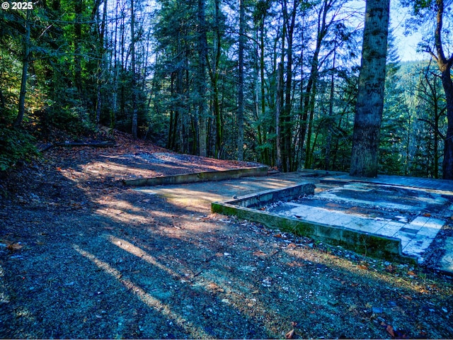 view of road with a view of trees